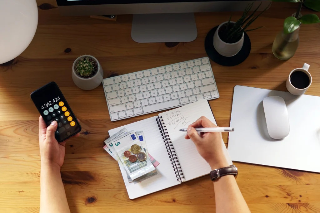 closeup shot entrepreneur working from home his personal finances savings 11zon 1
