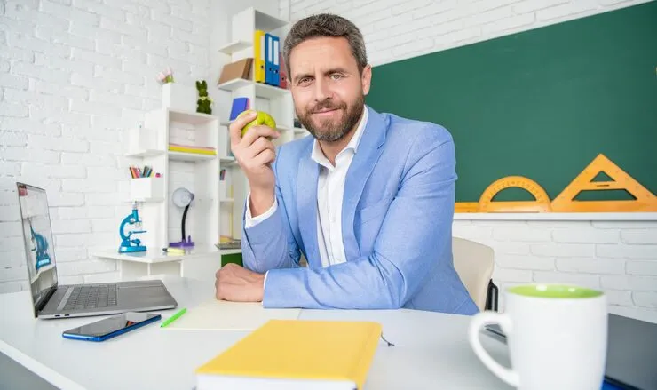 happy school teacher classroom having lunch break with apple 474717 35213 11zon